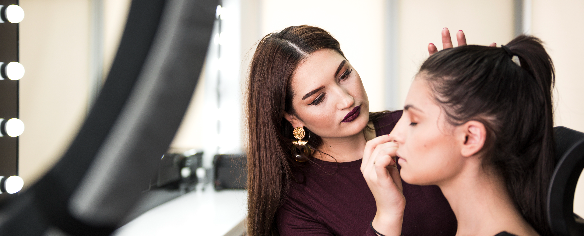 Prom and Graduation Beauty Guide in Abbotsford – Professional makeup application at Salon77 helping students prepare for prom and graduation events