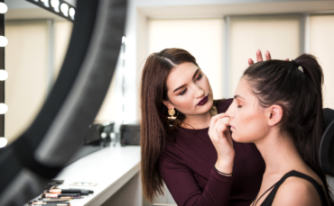 Prom and Graduation Beauty Guide in Abbotsford – Professional makeup application at Salon77 helping students prepare for prom and graduation events